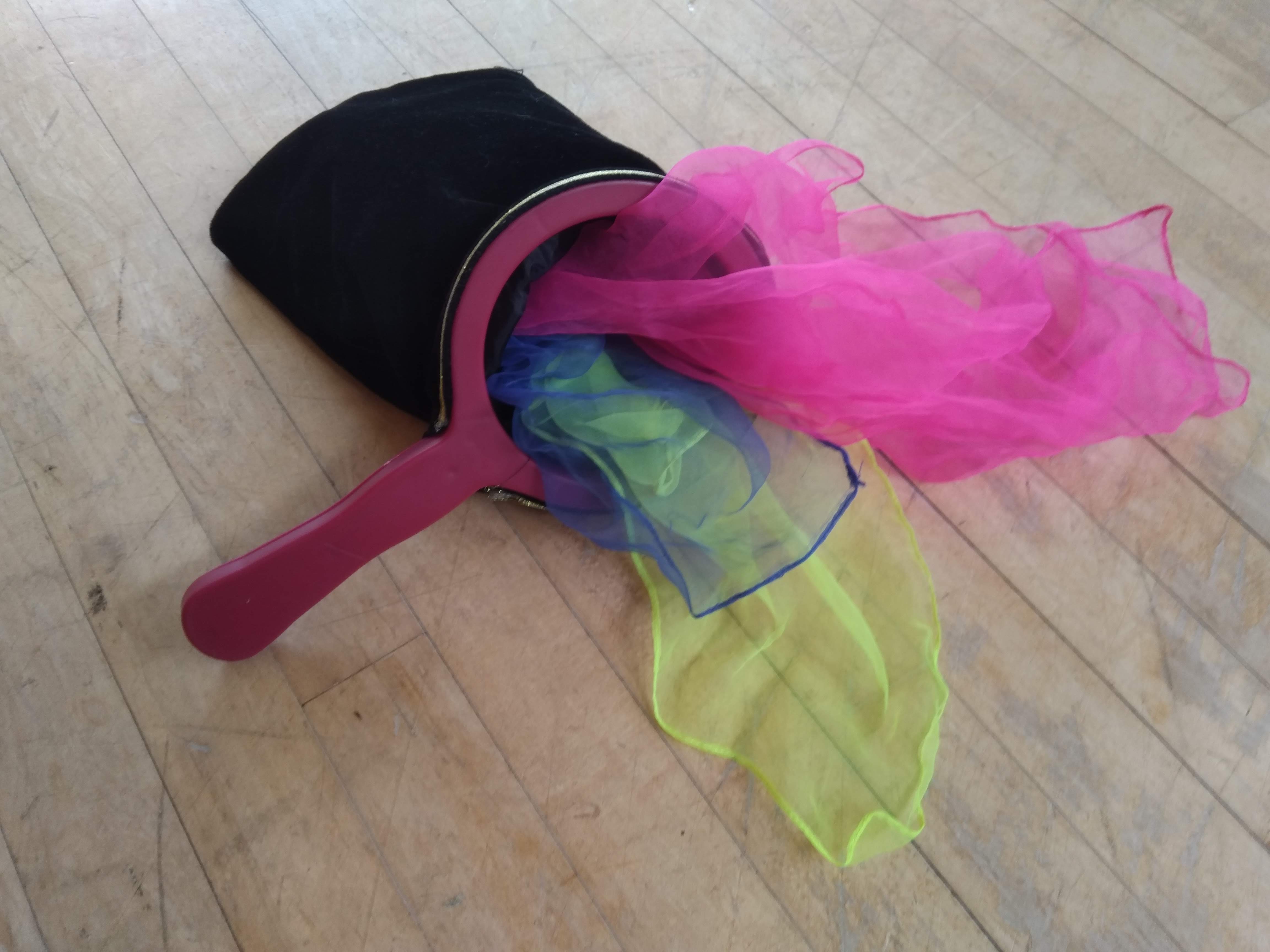 Juggling Scarfs (perhaps you can produce them from a Vanishing Purse?!)